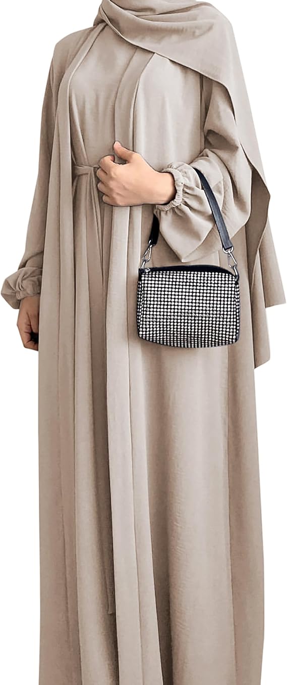 Loose beige abaya styled with a neutral hijab